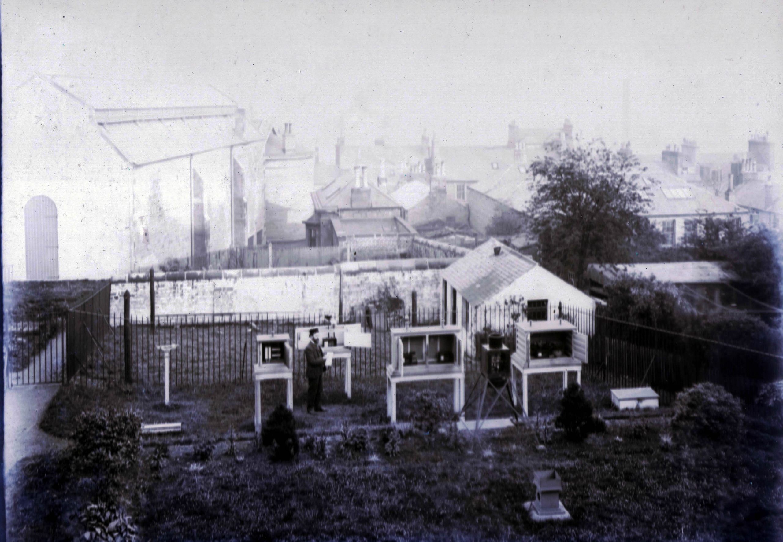 Man doing weather experiments with scientific instruments in Coats Observatory grounds, 19th Century