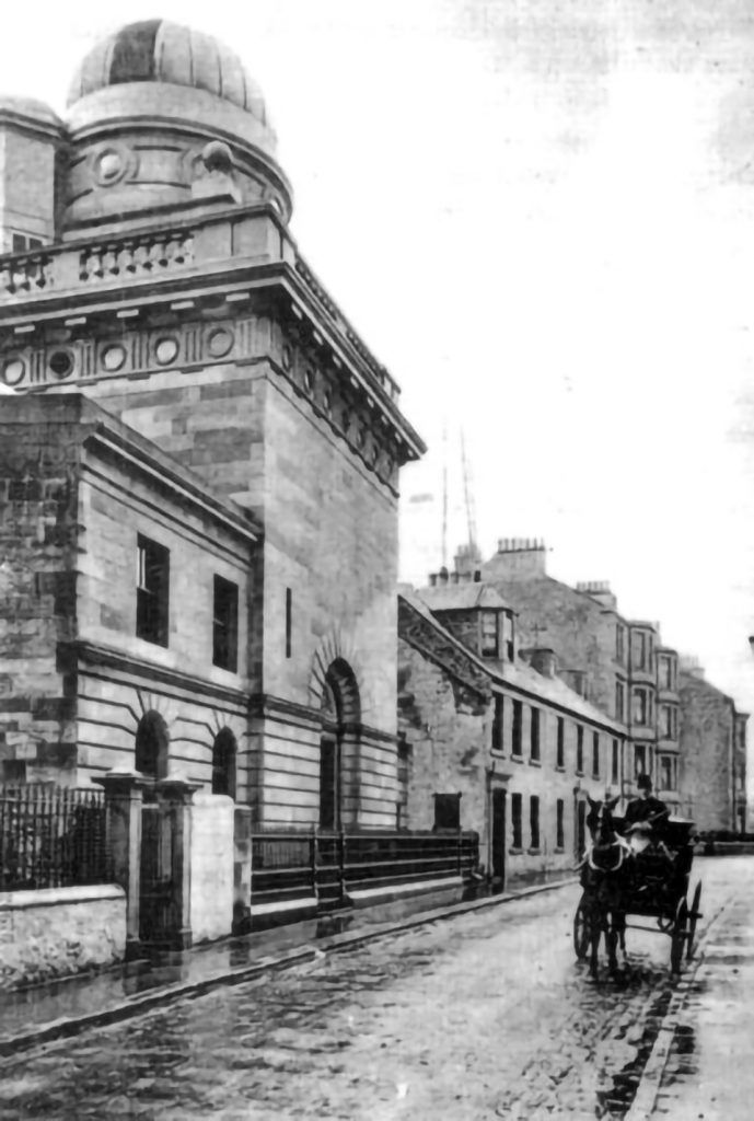 Black and white photograph of Coats Observatory taken from Oakshaw street in the late 19th century. A person driving a horse drawn cart is shown outside the Observatory entrance.