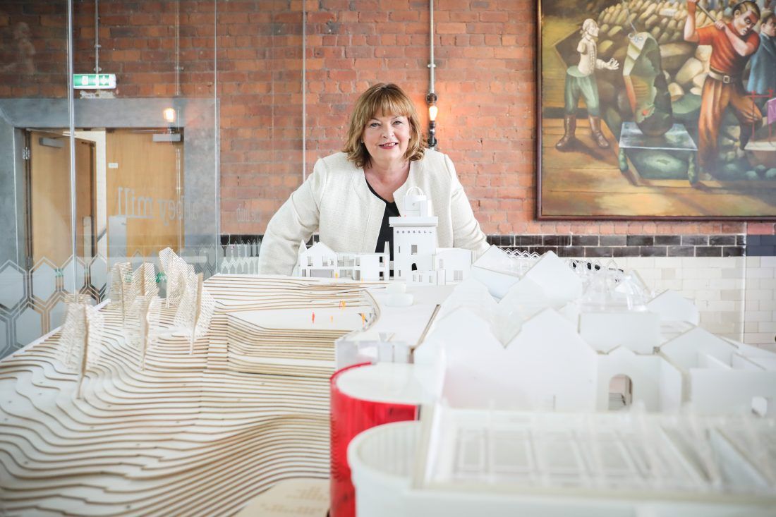 Cabinet Secretary for Economy, Fair Work and Culture, Fiona Hyslop with Paisley Museum model.