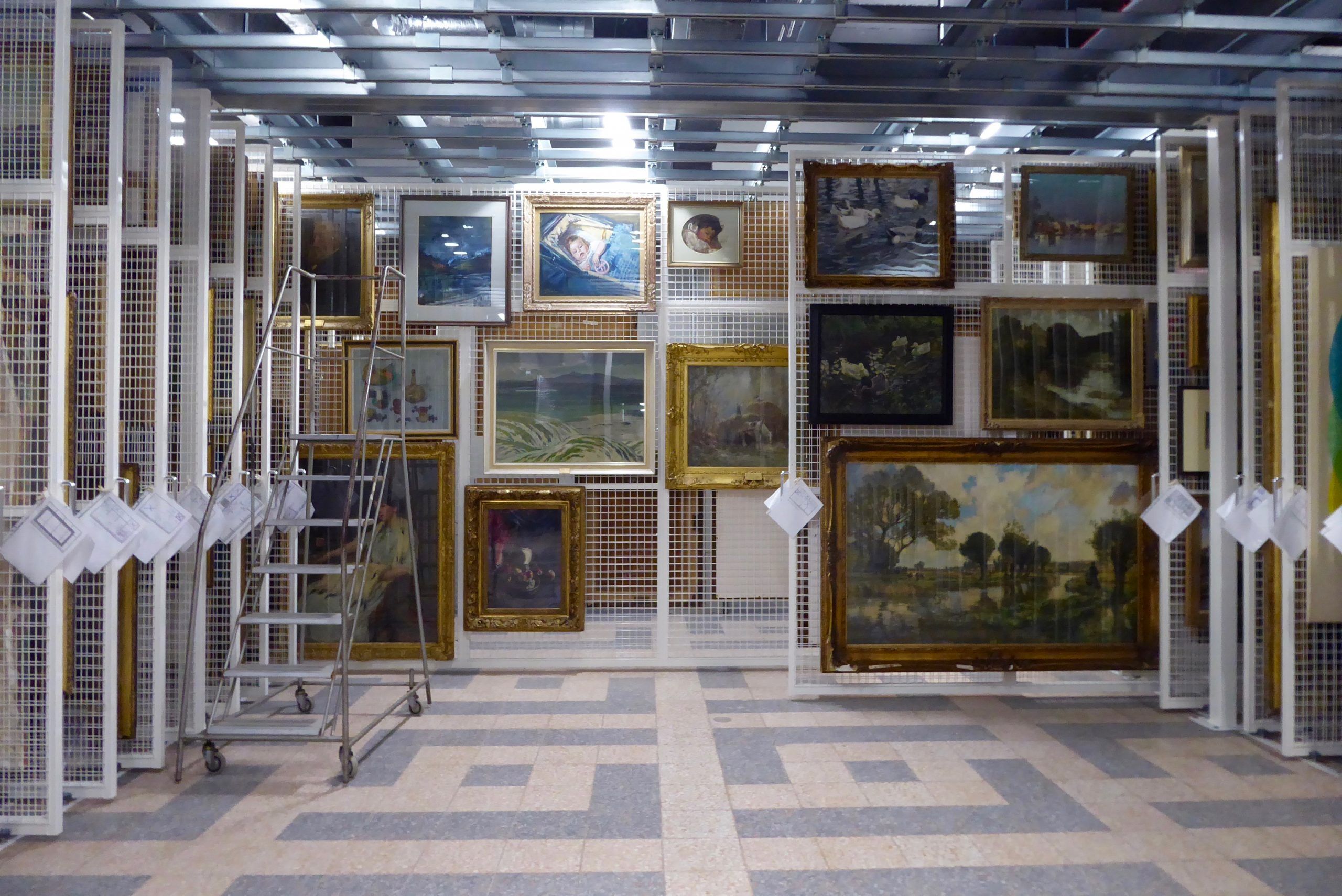 Wall of paintings in Secret Collection